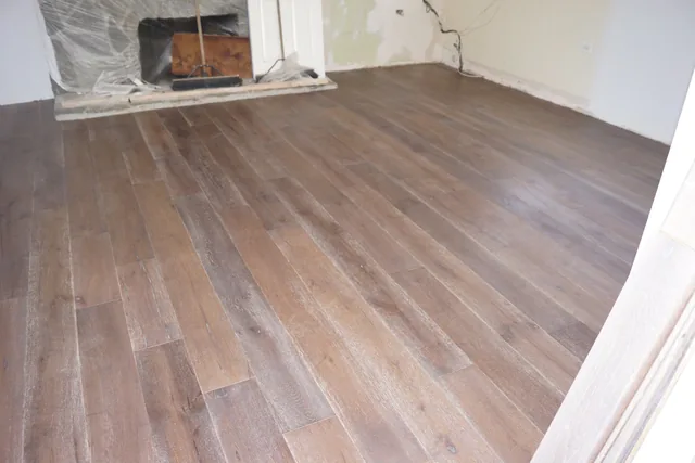 Dark wide-plank hardwood floor in a Pasadena living room