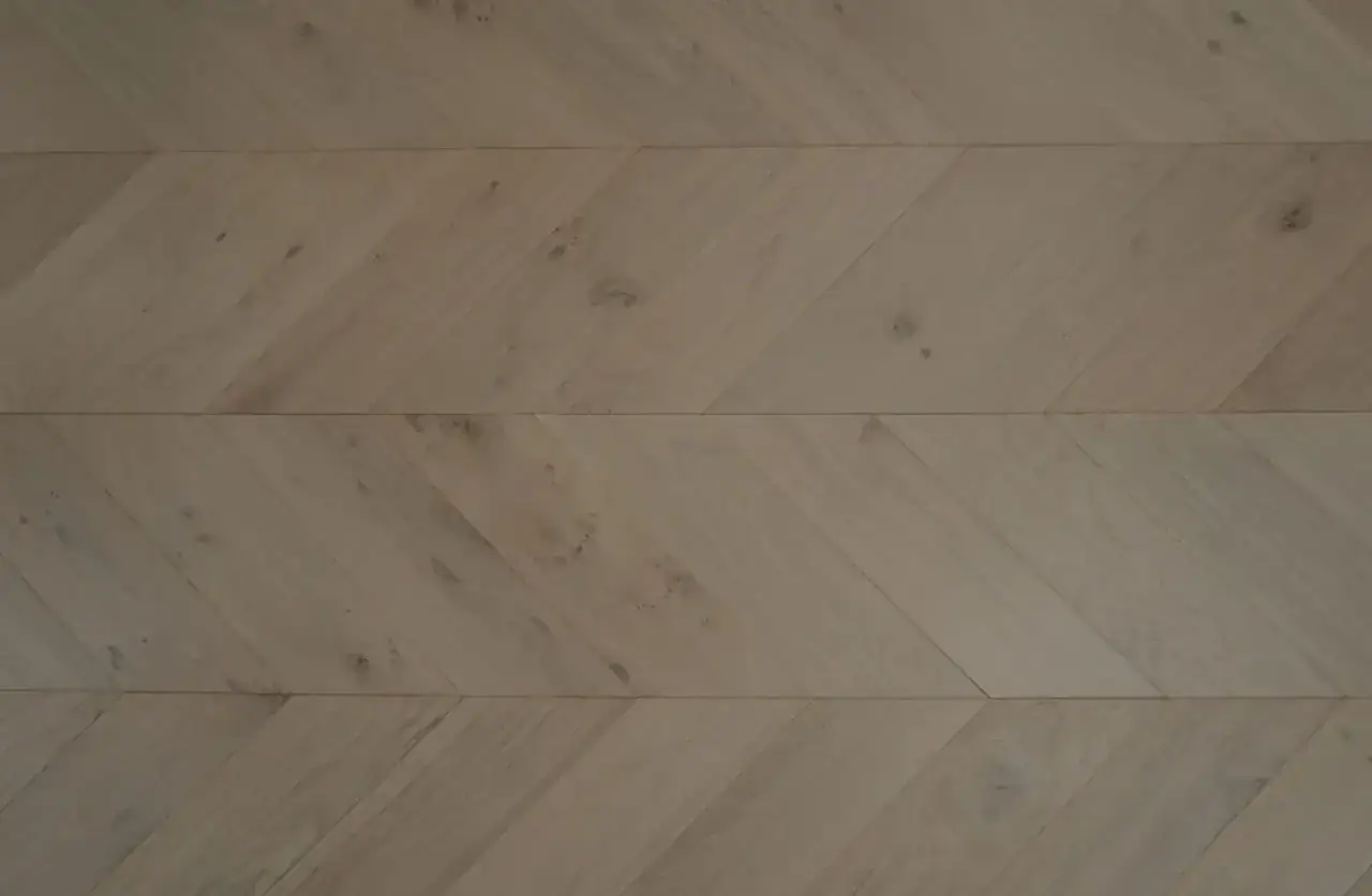 Bergamo Floors Herringbone & Chevron Turin Chevron Corta European White Oak Engineered Hardwood, installed in a room