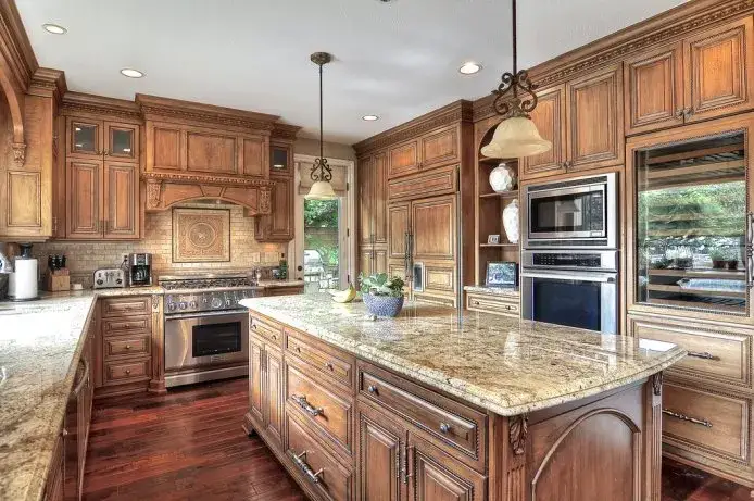 Garrison Garrison II Distressed Antique – Distressed Walnut Engineered Hardwood, installed in a room