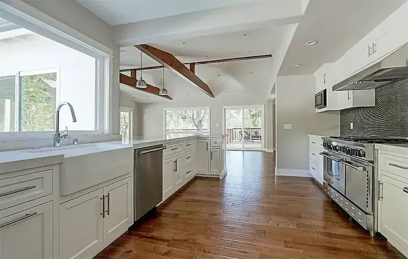 Garrison Garrison II Distressed Chestnut – Distressed Maple Engineered Hardwood, installed in a room