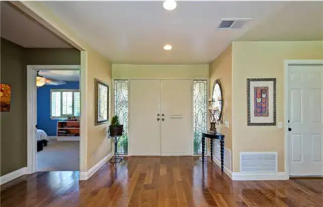 Garrison Garrison II Smooth Chestnut – Smooth Maple Engineered Hardwood, installed in a room