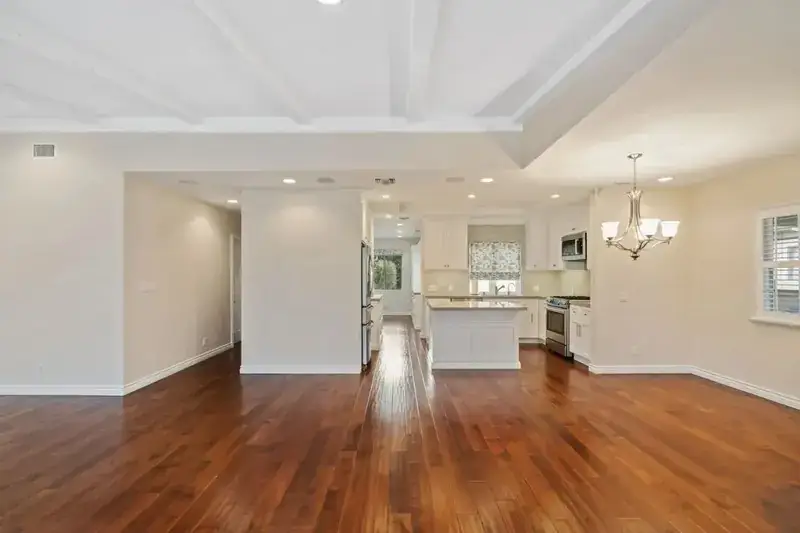 Garrison Garrison II Distressed Latte – Distressed Maple Engineered Hardwood, installed in a room