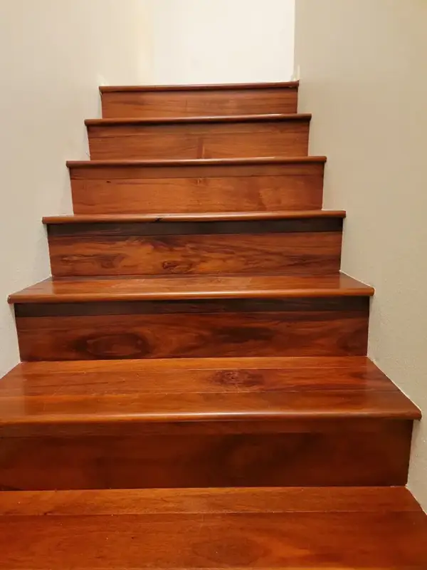 Garrison Exotics – 5″ Patagonian Rosewood Engineered Hardwood, installed in a room