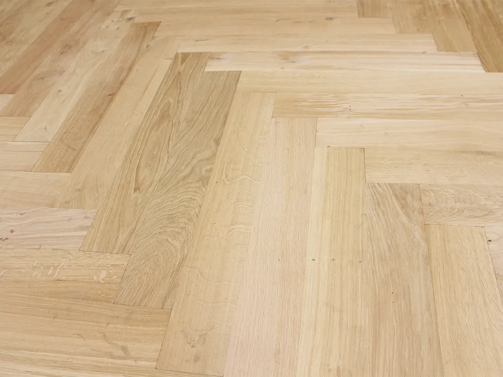 Monarch Plank Unfinished French Oak Herringbone Engineered Hardwood, room view