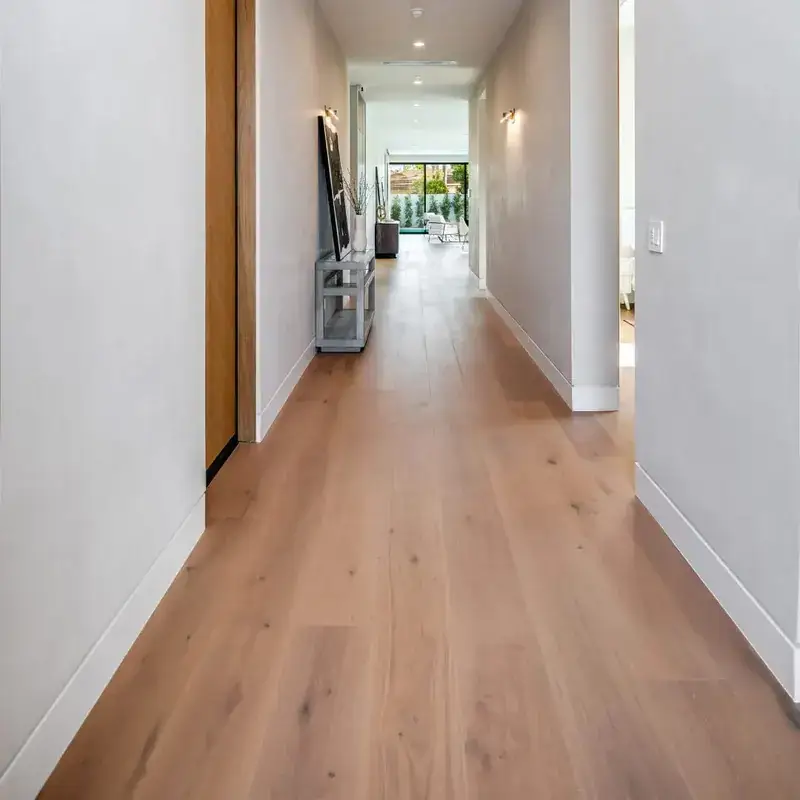 Opus Hardwood 10¼″ Plank Rhodes European Oak Engineered Hardwood, installed in a room
