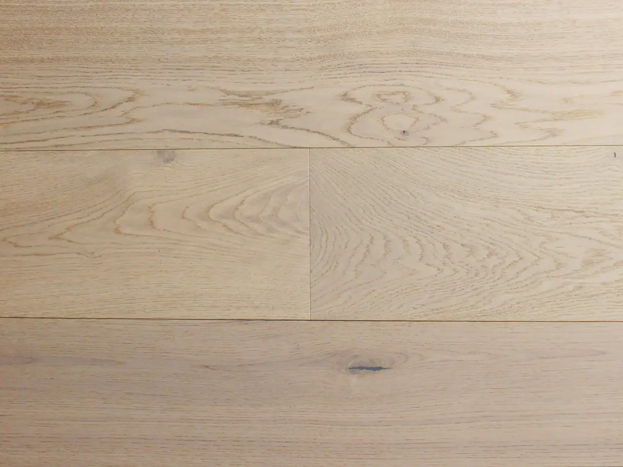 Pravada Floors Artistique Chanel European White Oak Engineered Hardwood, installed in a room