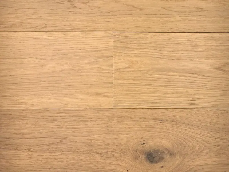 Pravada Floors Haute Couleur Chiffon Drape European White Oak Engineered Hardwood, installed in a room
