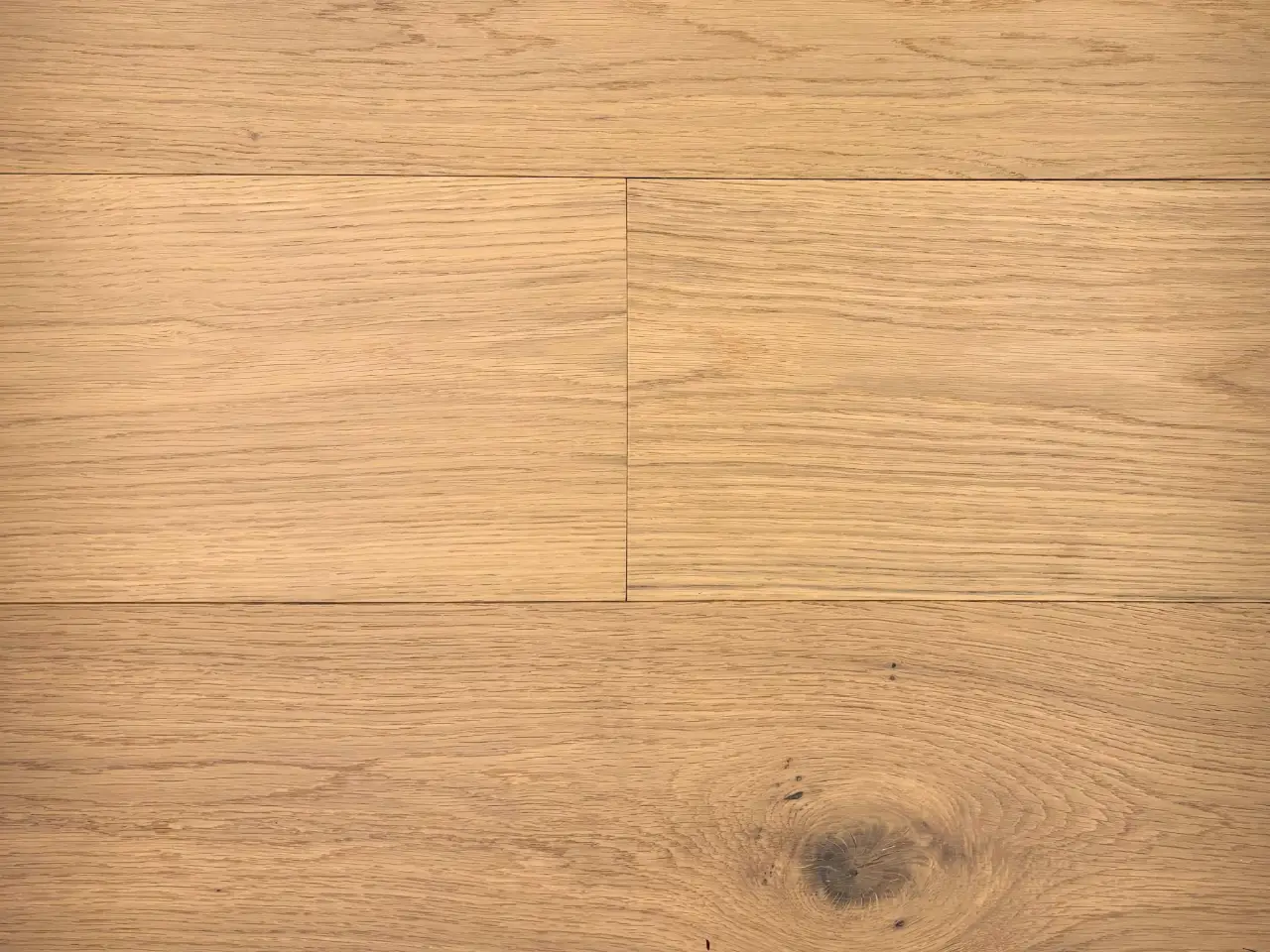 Pravada Floors Haute Couleur Chiffon Drape European White Oak Engineered Hardwood, installed in a room
