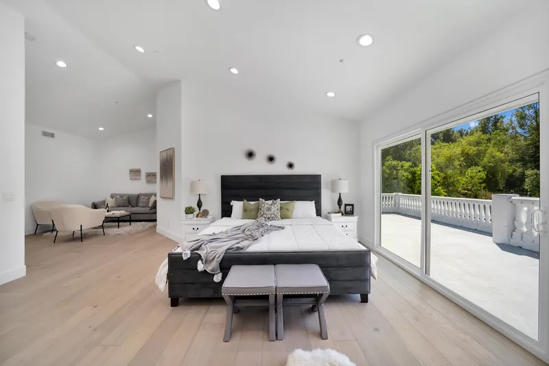 Primary bedroom with wide-plank European white oak hardwood floors