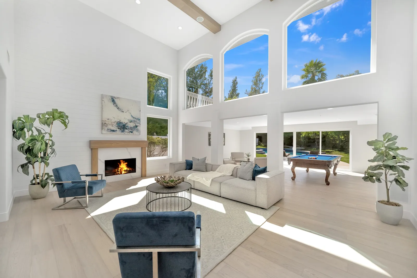 Two-story great room with 7.5 inch European white oak hardwood floors installed by Los Angeles Hardwoods